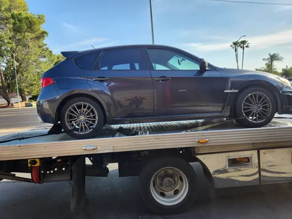 2014 Subaru Impreza on Mena's flatbed